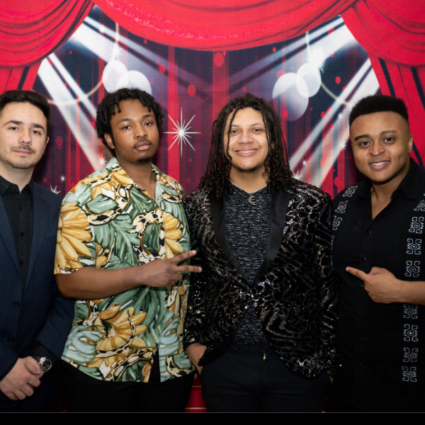 Four students pose together in front of a backdrop at Galvin Scholars Gormal 2024