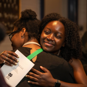 2024 Galvin Scholars Senior Brunch students Frances and Honey hugging