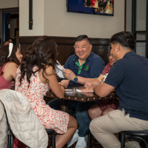 2024 Galvin Scholar Senior Toast family sitting around table at Foleys